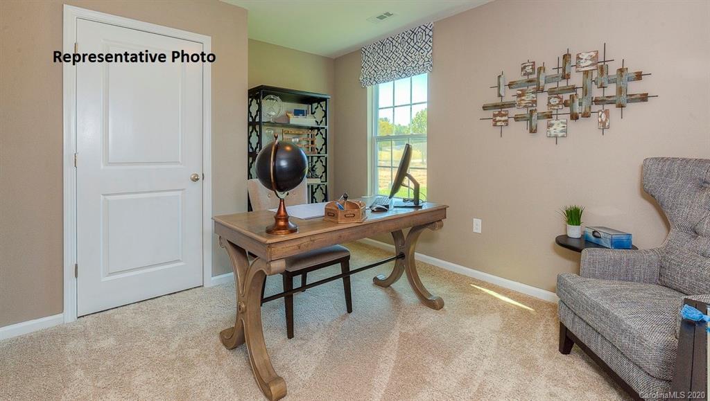 7261 Finnigan Road Charlotte, NC 28215 - Photo 26 of 40 a view of a workspace with furniture