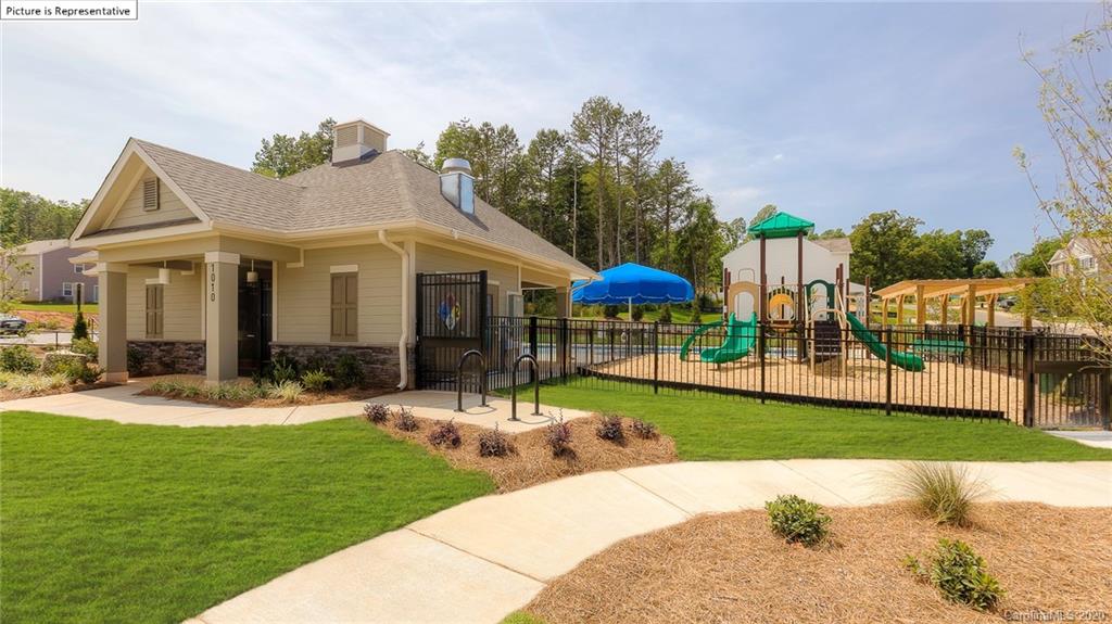 7261 Finnigan Road Charlotte, NC 28215 - Photo 38 of 40 a view of a house with a yard