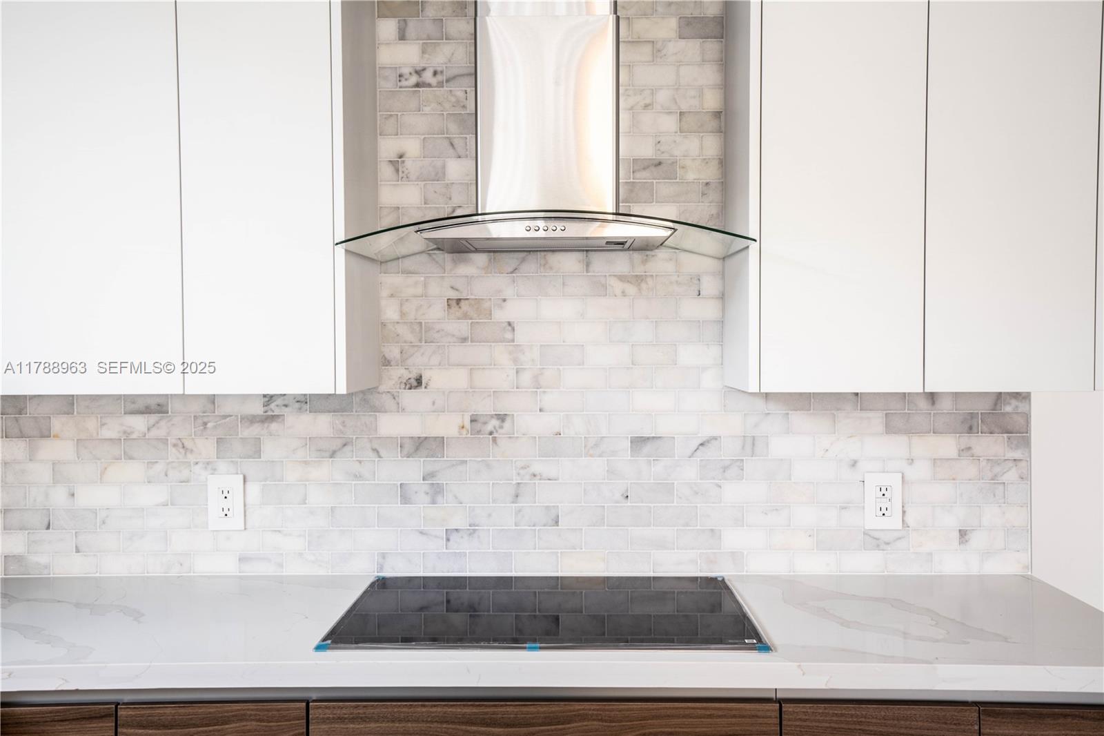 910 Southwest 24th Road Miami, FL 33129 - Photo 14 of 38 a bathroom with a bathtub