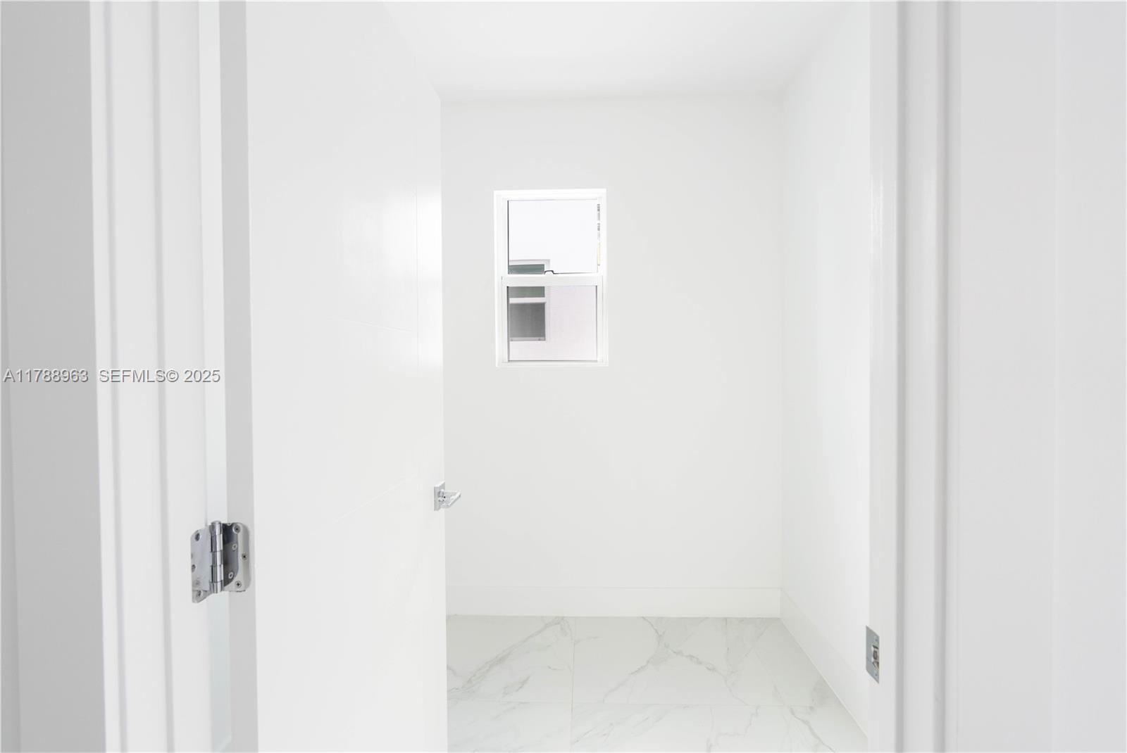 910 Southwest 24th Road Miami, FL 33129 - Photo 21 of 38 a small space with a window