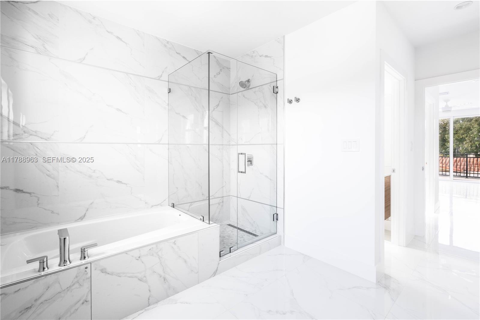 910 Southwest 24th Road Miami, FL 33129 - Photo 31 of 38 a bathroom with a bathtub and a shower