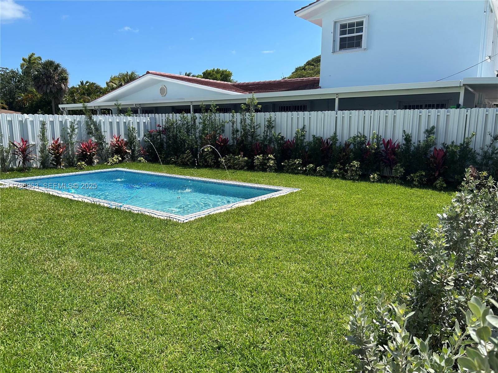 910 Southwest 24th Road Miami, FL 33129 - Photo 36 of 38 a view of a garden