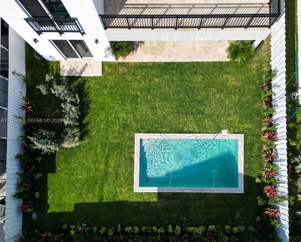910 Southwest 24th Road Miami, FL 33129 - Photo 38 of 38 a view of a back yard of the house and green space