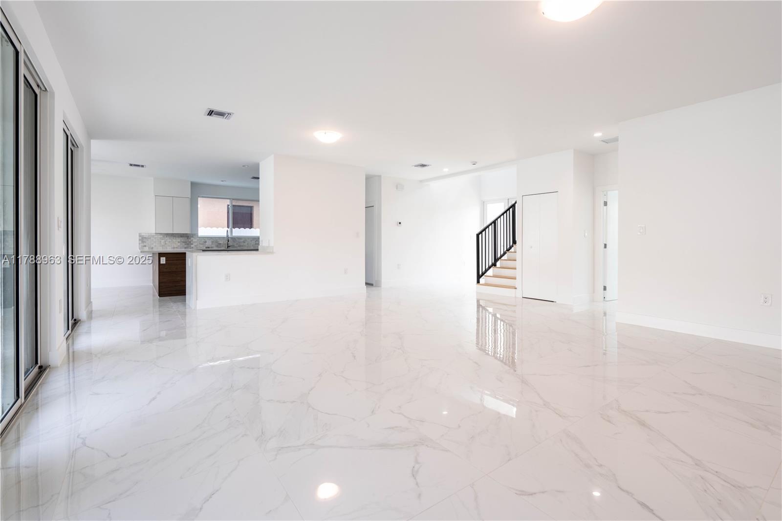 910 Southwest 24th Road Miami, FL 33129 - Photo 10 of 38 a view of a kitchen with a sink