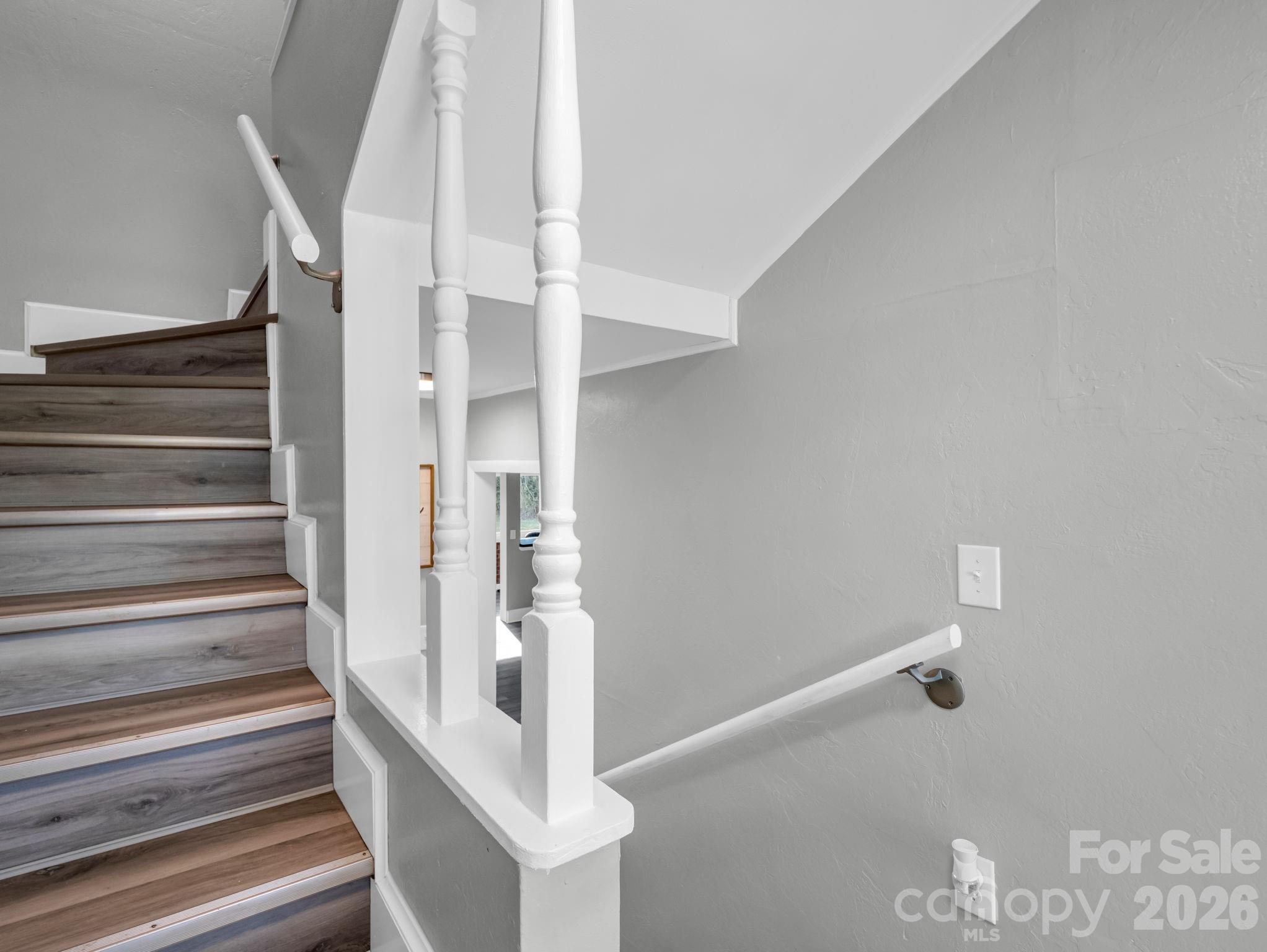 151 South Main Street Bostic, NC 28018 - Photo 11 of 45 a view of staircase with white walls and white walls