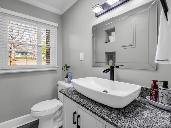 a bathroom with a sink and a toilet