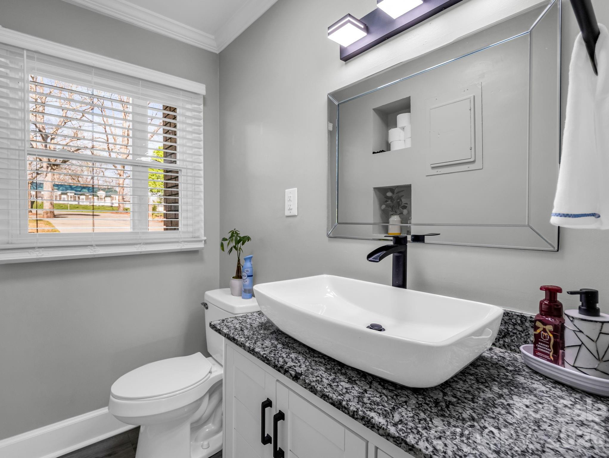 151 South Main Street Bostic, NC 28018 - Photo 22 of 45 a bathroom with a sink and a toilet