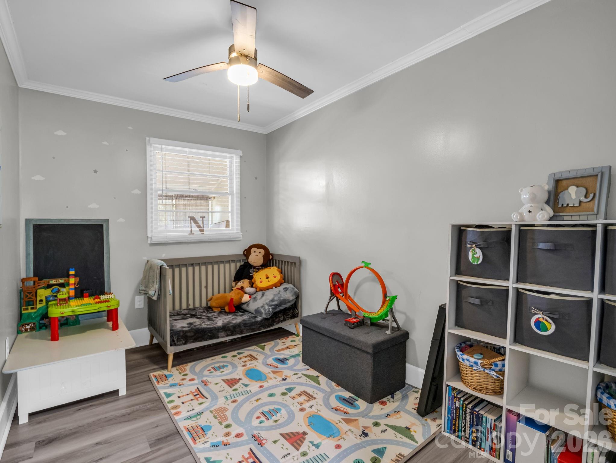 151 South Main Street Bostic, NC 28018 - Photo 29 of 45 a bedroom with furniture a rug toys and a window