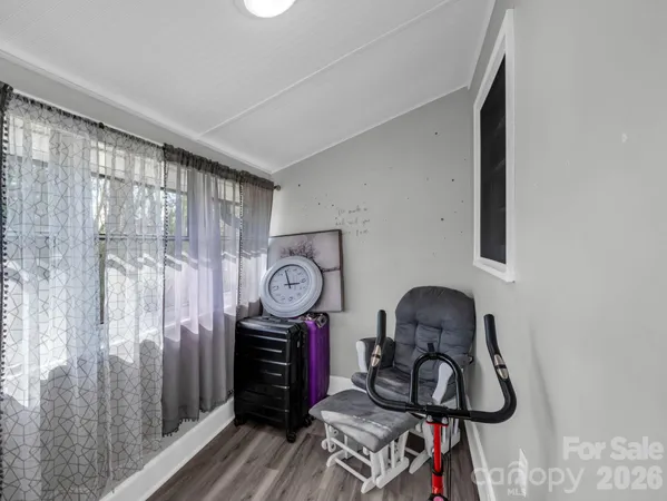 a view of a hallway with washer and dryer