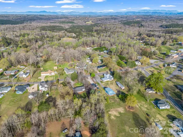 a view of a city with mountains in the background