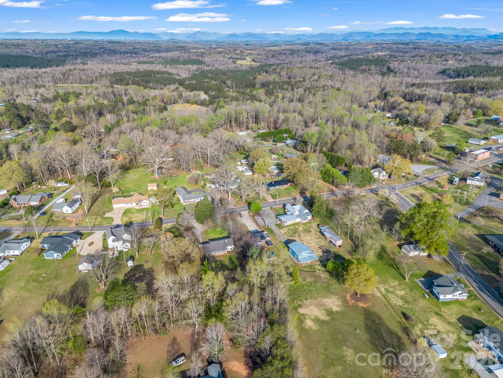 151 South Main Street Bostic, NC 28018 - Photo 39 of 45 a view of a city with green field