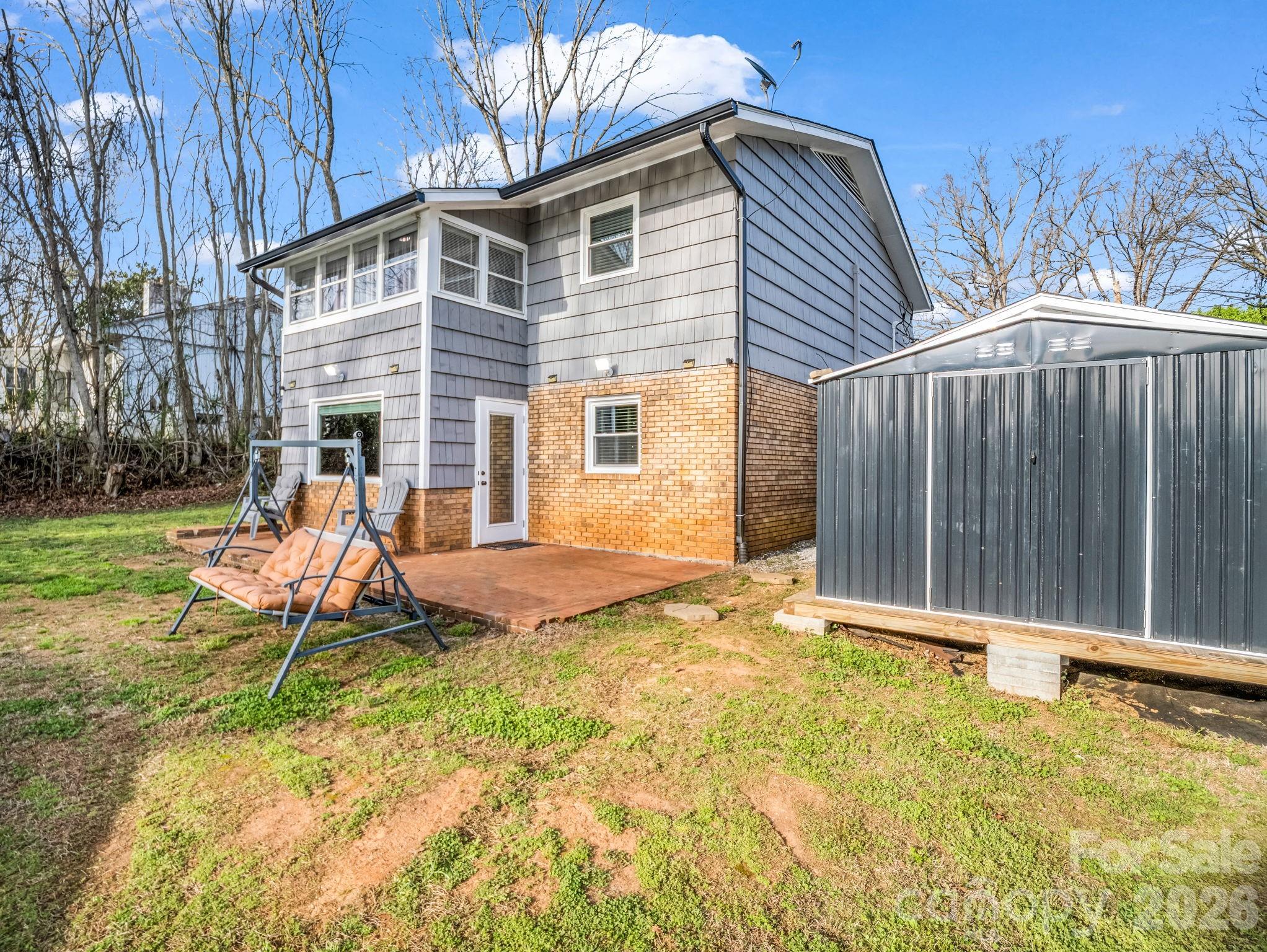 151 South Main Street Bostic, NC 28018 - Photo 9 of 45 a view of a house with backyard and sitting area