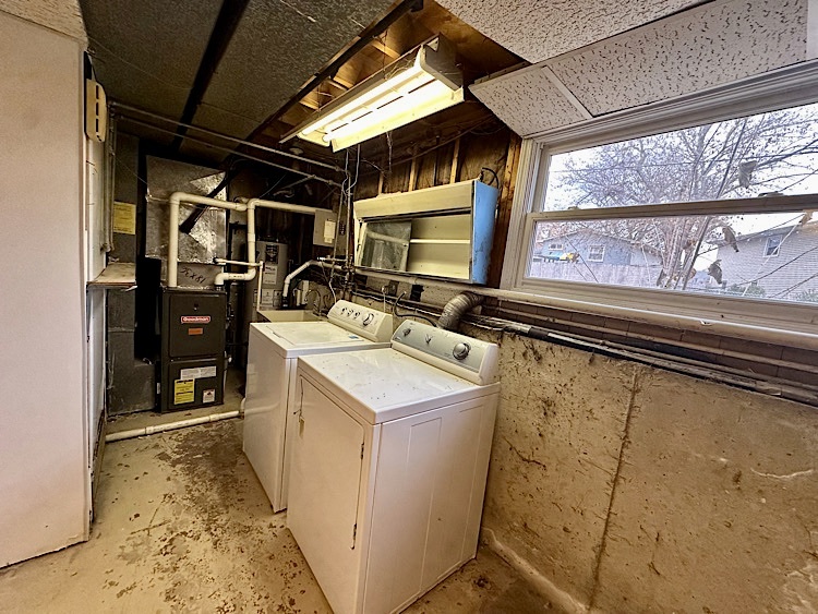 7777 Ramsgate Circle South Hanover Park, IL 60133 - Photo 23 of 26 a utility room with dryer and washer
