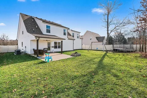 a house view with a outdoor space