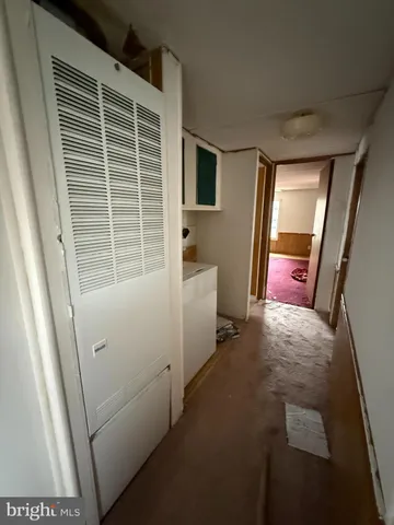 view of an empty room with a window