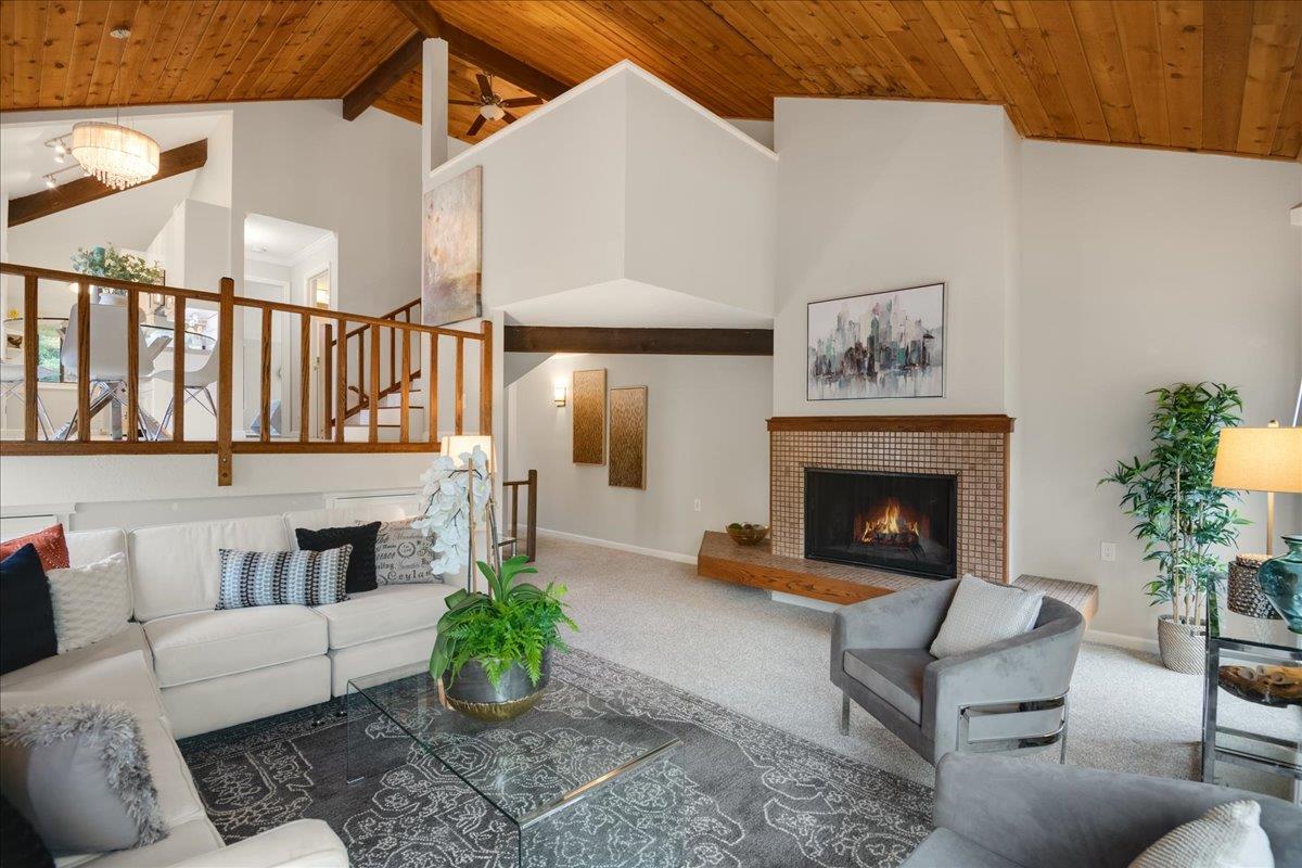 146 Bean Creek Road, Unit E1 Scotts Valley, CA 95066 - Photo 2 of 17 a living room with furniture and a fireplace