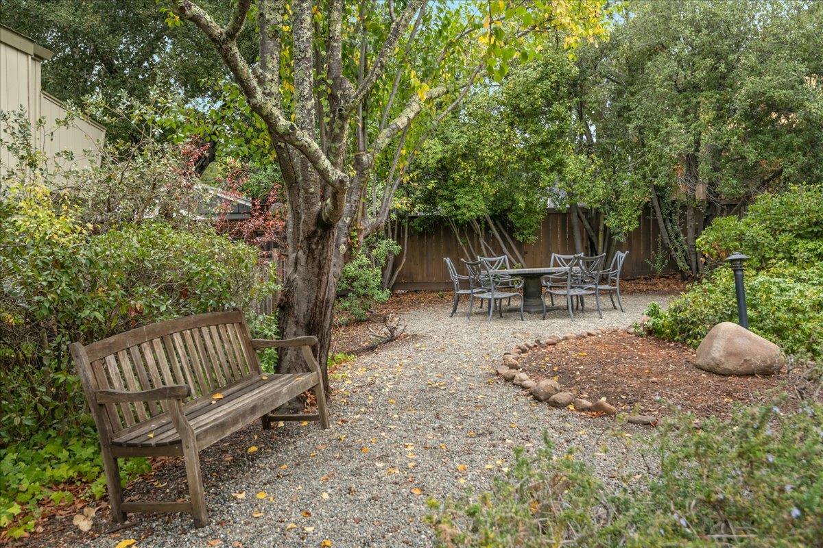 146 Bean Creek Road, Unit E1 Scotts Valley, CA 95066 - Photo 17 of 17 a garden view with a seating space