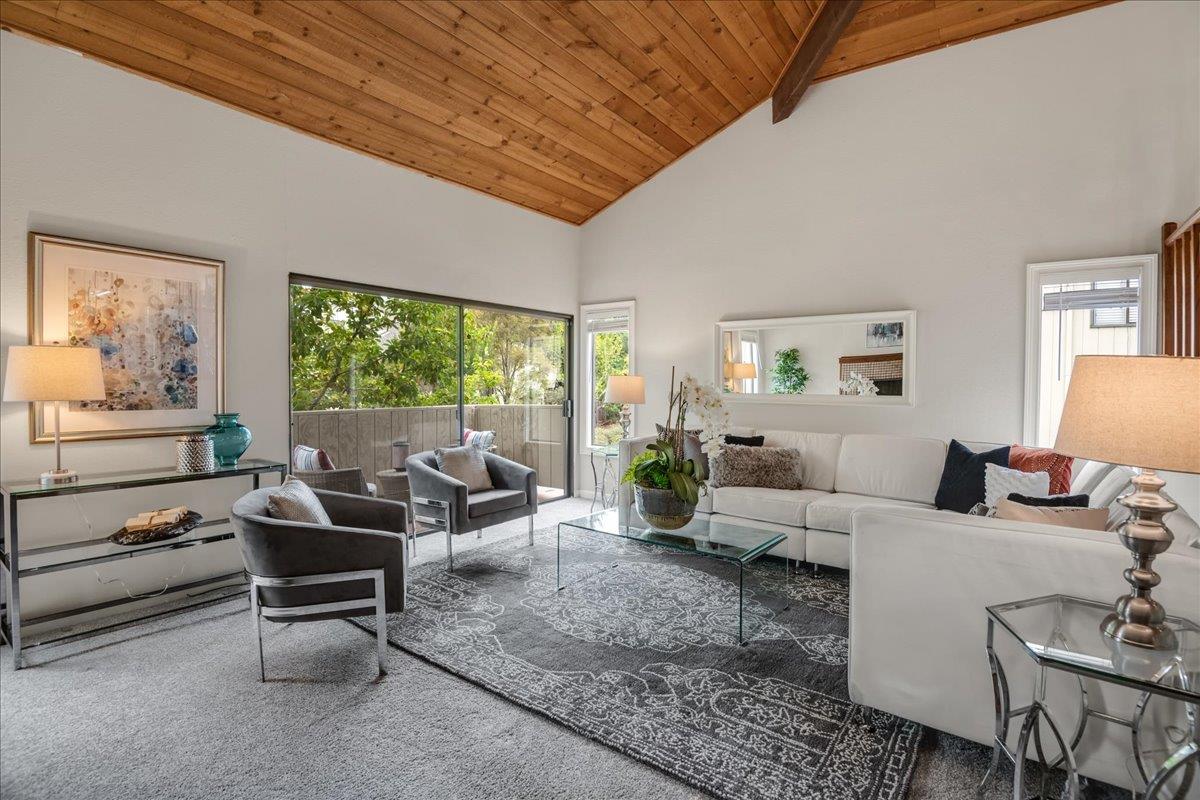 146 Bean Creek Road, Unit E1 Scotts Valley, CA 95066 - Photo 3 of 17 a living room with furniture and a large window