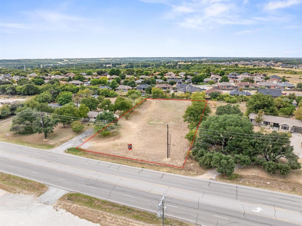 1835 North Main Street Weatherford, TX 76085 - Photo 4 of 7 an aerial view of residential building and ocean view