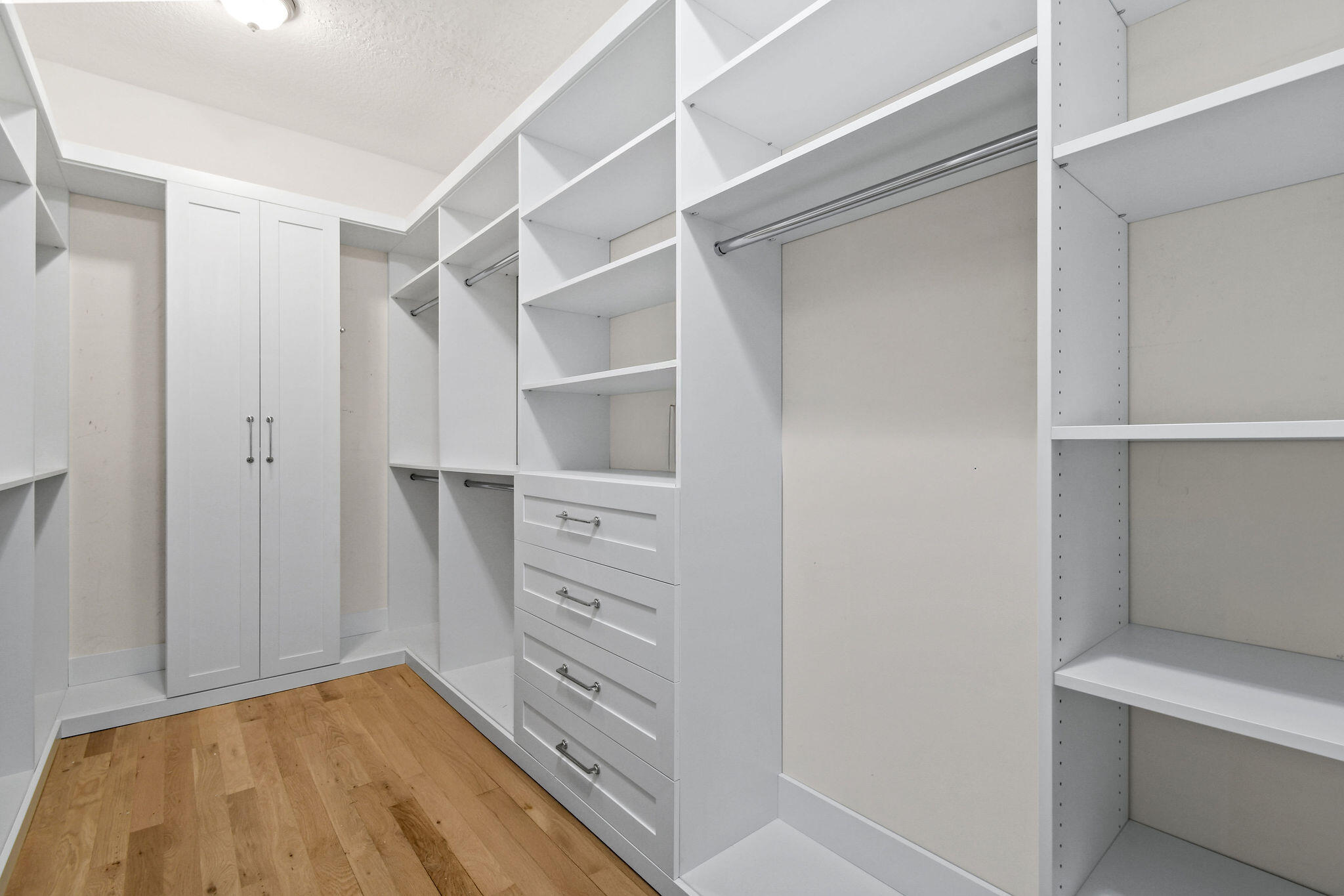 201 Avila Road West Palm Beach, FL 33405 - Photo 44 of 75 a view of walk in closet with empty racks