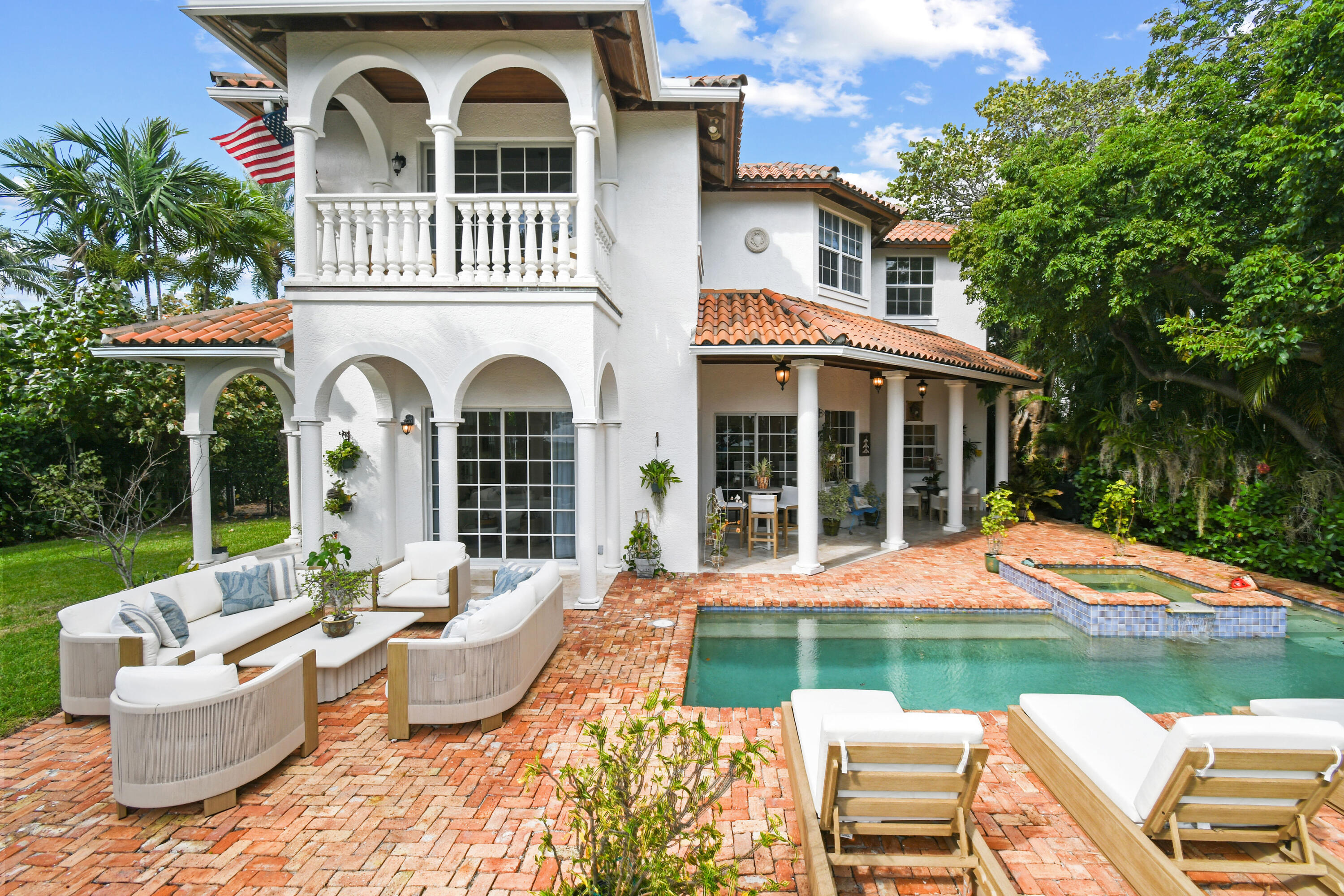 201 Avila Road West Palm Beach, FL 33405 - Photo 61 of 75 a view of a house with backyard sitting area and garden