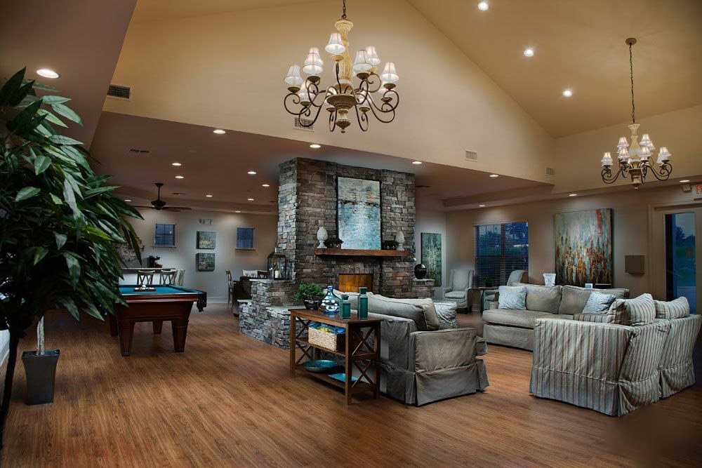 3400 McCullough Boulevard Belden, MS 38826 - Photo 3 of 15 a living room with furniture and a chandelier