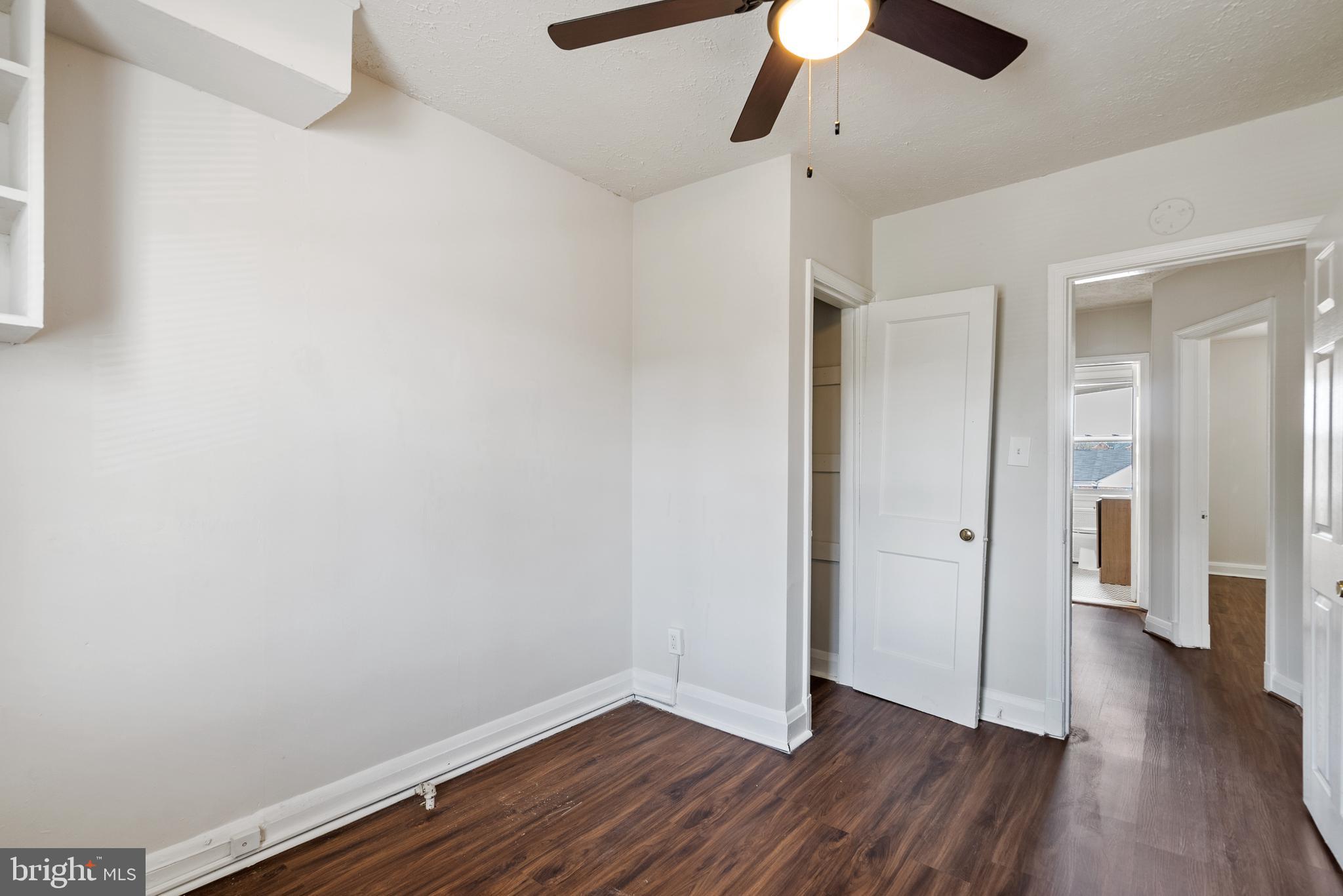 1617 Northwick Road Baltimore, MD 21218 - Photo 15 of 32 a view of an empty room and wooden floor