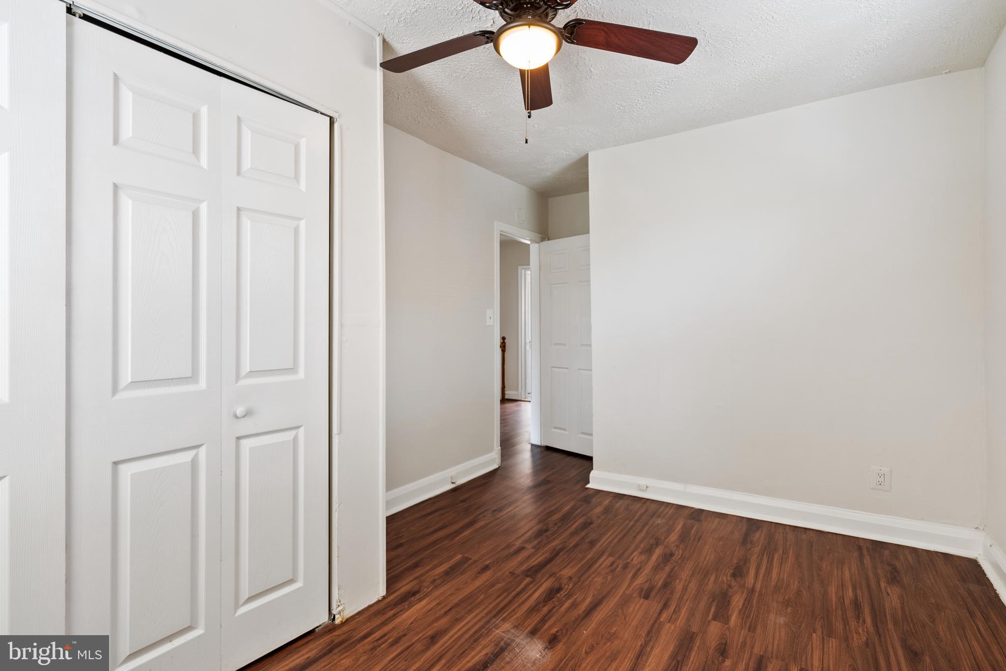 1617 Northwick Road Baltimore, MD 21218 - Photo 17 of 32 wooden floor in an empty room