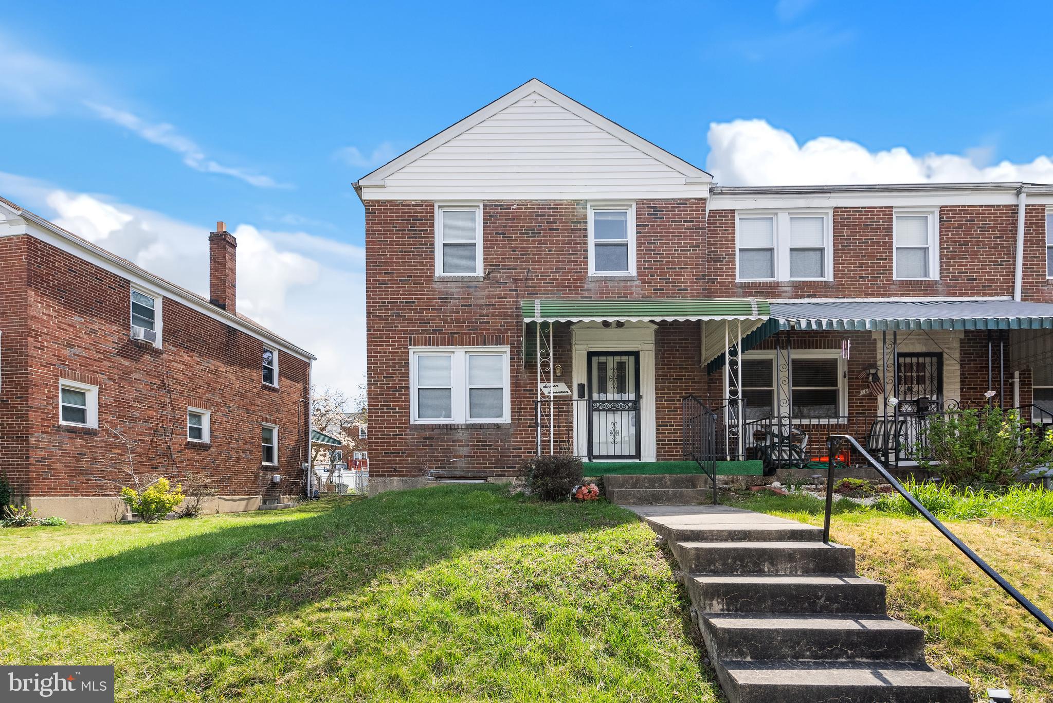 1617 Northwick Road Baltimore, MD 21218 - Photo 2 of 32 a front view of a house with garden