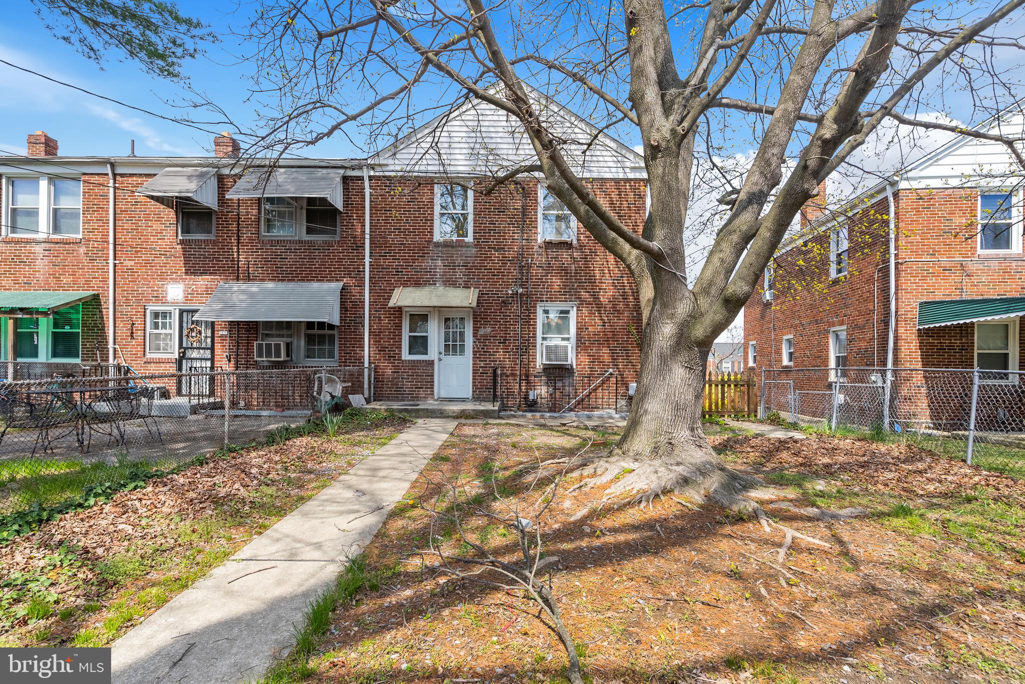 1617 Northwick Road Baltimore, MD 21218 - Photo 26 of 32 a view of a house with a yard