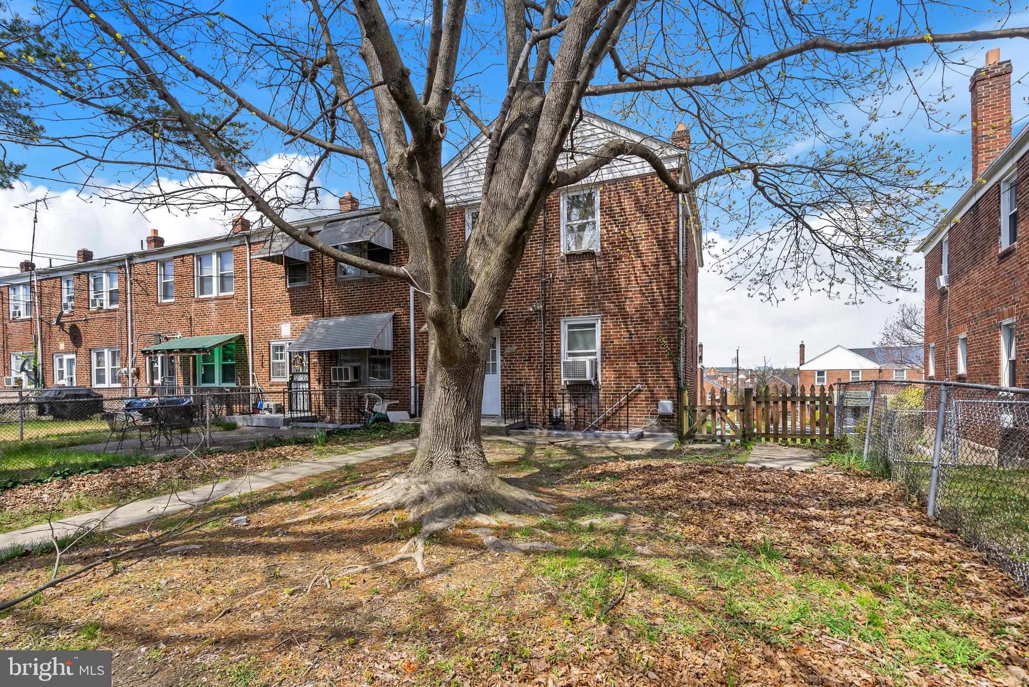 1617 Northwick Road Baltimore, MD 21218 - Photo 27 of 32 a view of a house with a yard