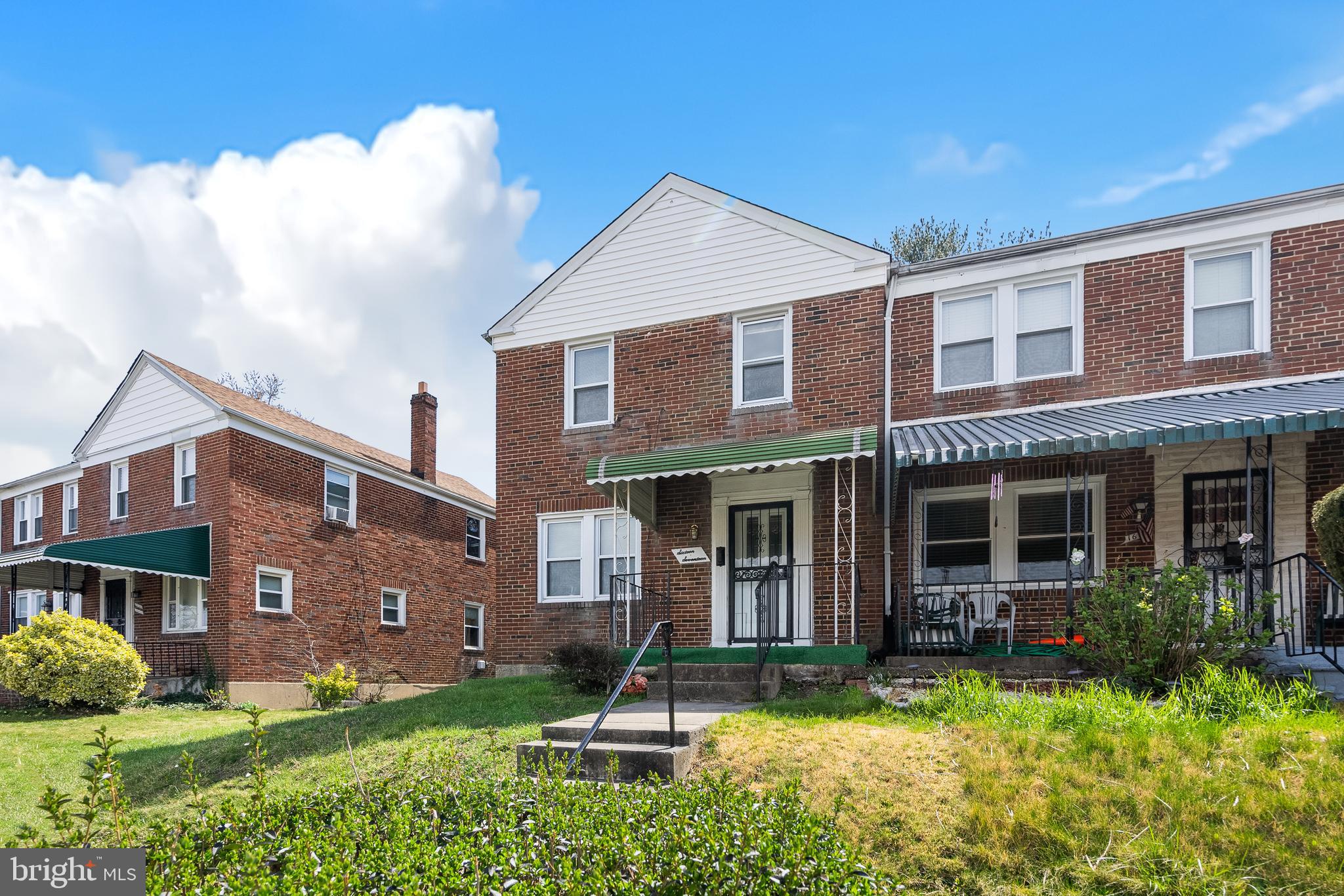 1617 Northwick Road Baltimore, MD 21218 - Photo 30 of 32 a front view of a house with garden
