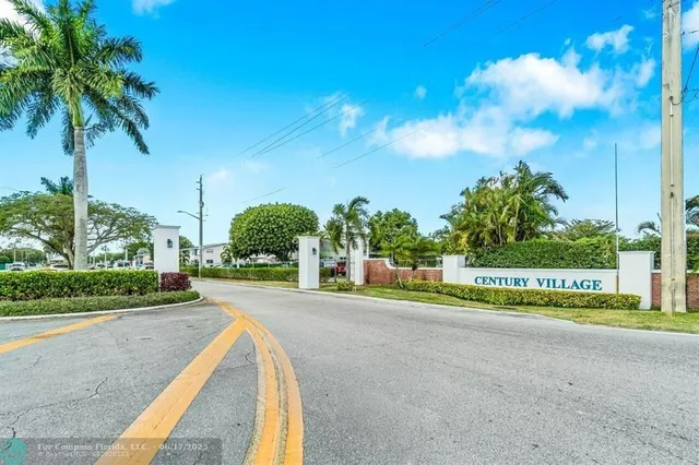 a view of a street with a houses