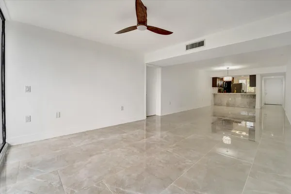 a view of an empty room and window