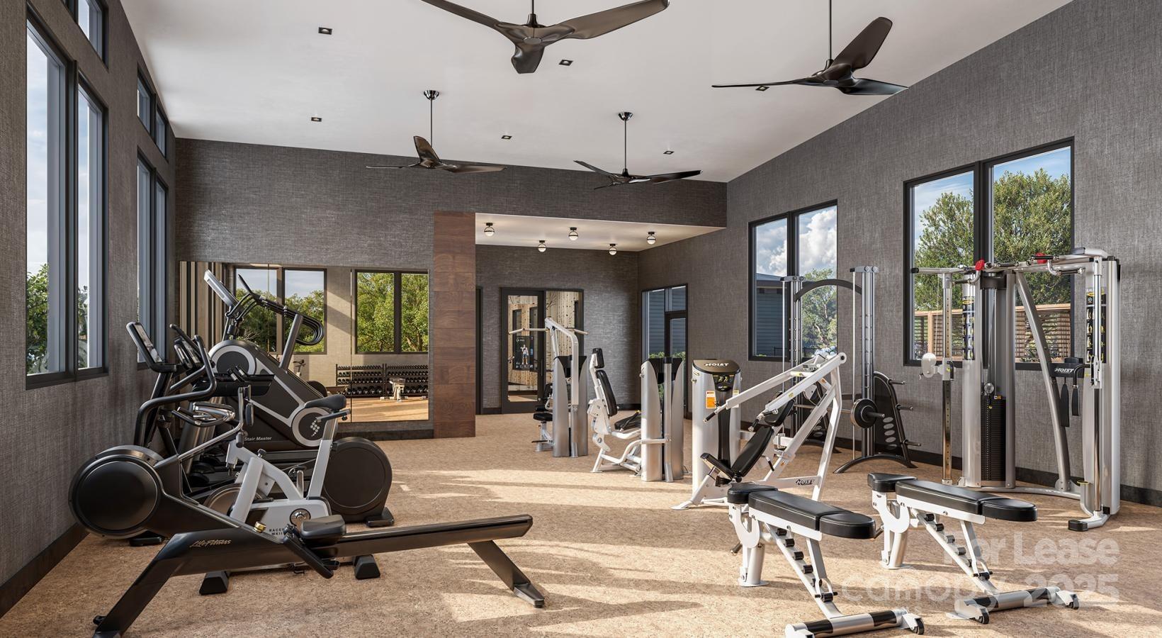 9414 Mallard Creek Road, Unit COTTONWOOD Charlotte, NC 28262 - Photo 13 of 13 a view of a room with gym equipment