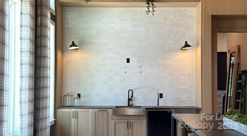 9414 Mallard Creek Road, Unit COTTONWOOD Charlotte, NC 28262 - Photo 3 of 13 a bathroom with a granite countertop sink a mirror and shower