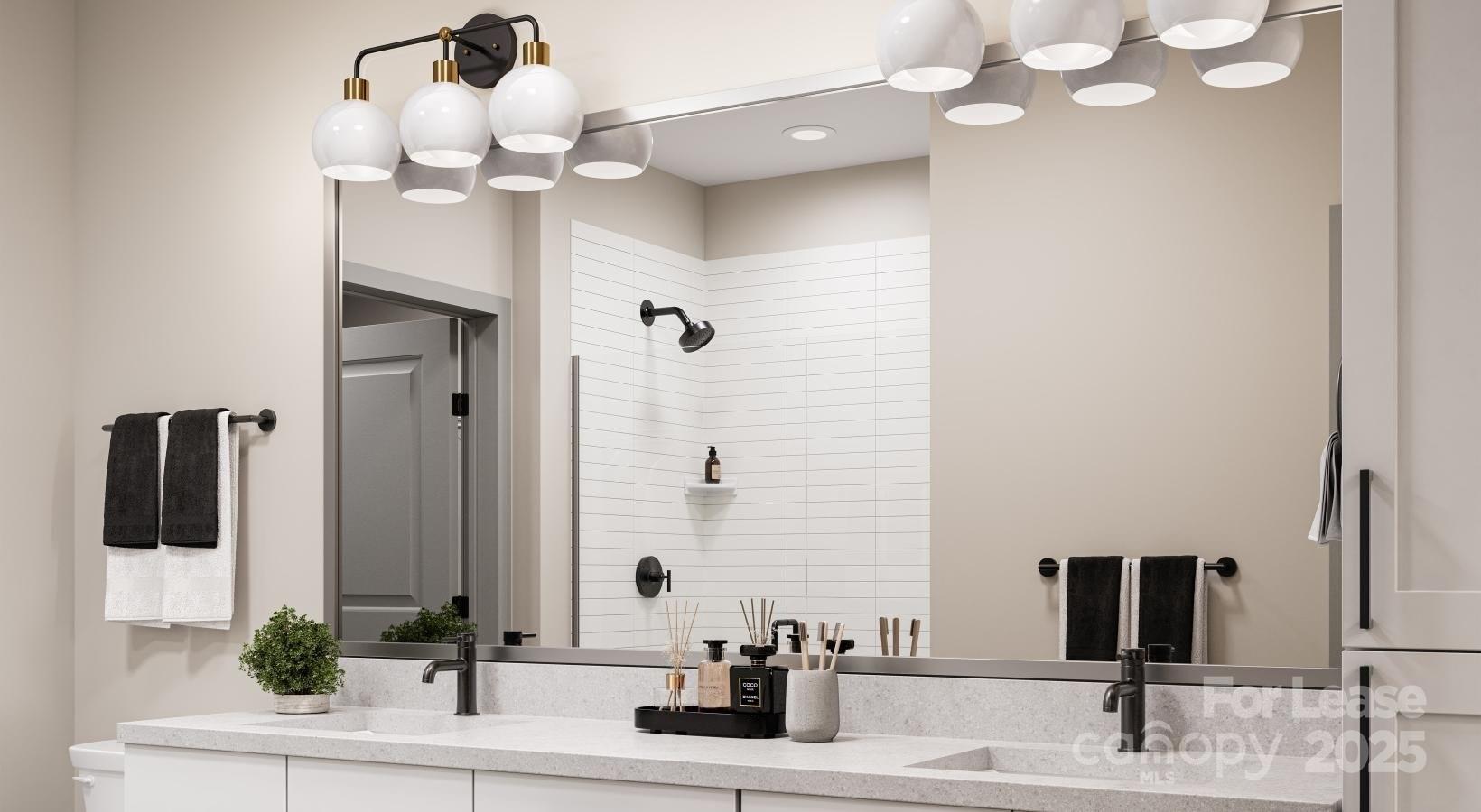 9414 Mallard Creek Road, Unit COTTONWOOD Charlotte, NC 28262 - Photo 9 of 13 a bathroom with a sink vanity and a mirror
