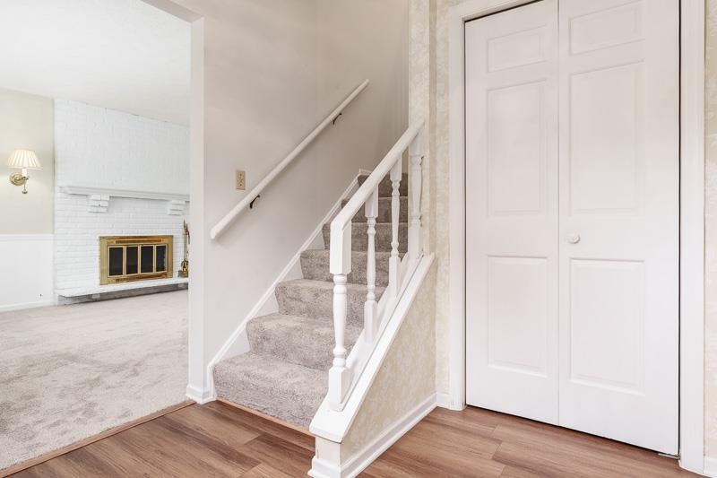 5792 Haddon Place Rockford, IL 61114 - Photo 4 of 47 a view of entryway and hall with wooden floor