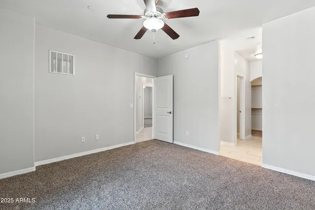 an empty room with windows