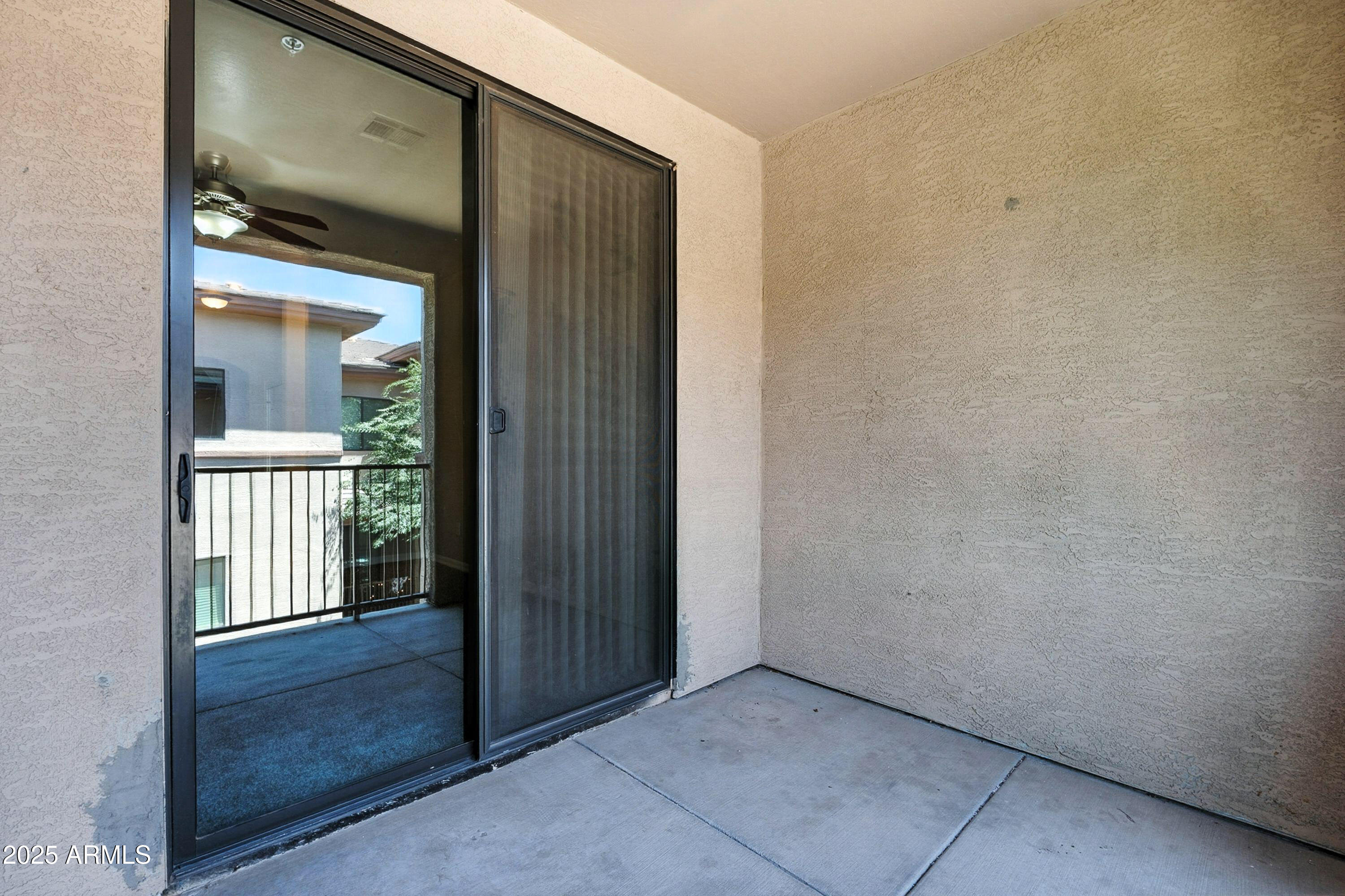 3330 South Gilbert Road, Unit 2066 Chandler, AZ 85286 - Photo 20 of 67 an empty room with windows