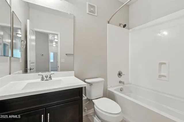 an aerial view of a house with a garden