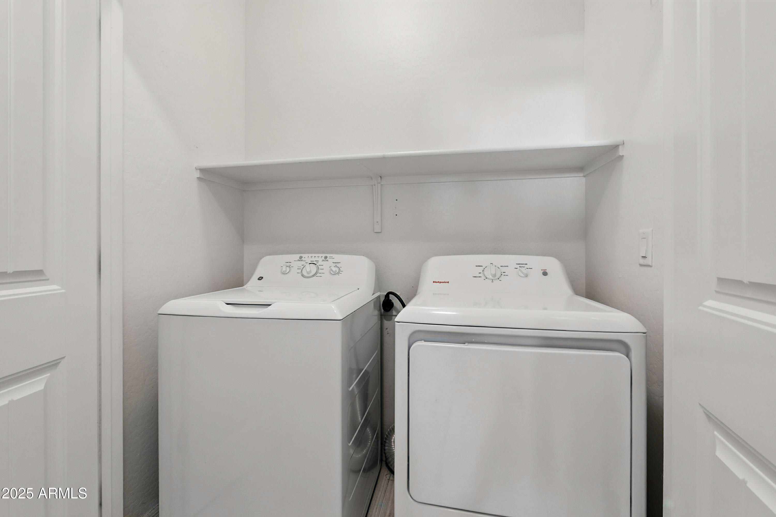 3330 South Gilbert Road, Unit 2066 Chandler, AZ 85286 - Photo 25 of 67 a utility room with dryer and washer