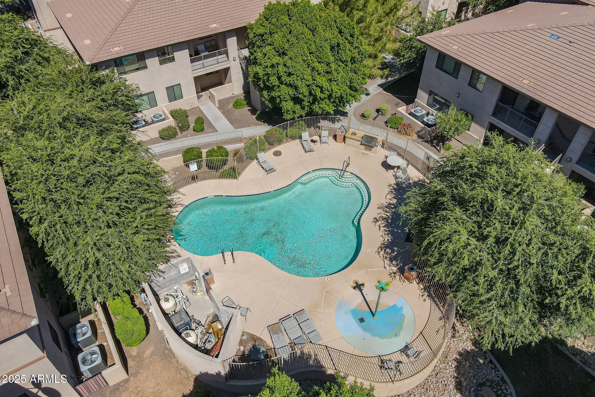 3330 South Gilbert Road, Unit 2066 Chandler, AZ 85286 - Photo 38 of 67 an aerial view of a house with garden space and outdoor seating