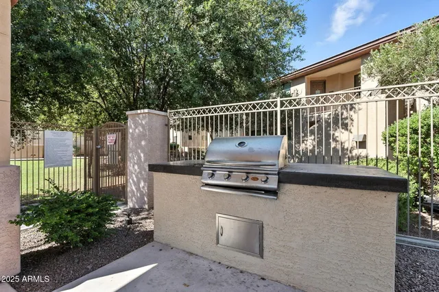 a view of house with outdoor sitting space