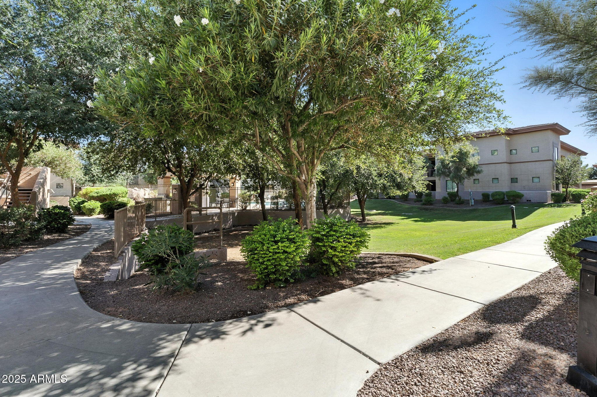 3330 South Gilbert Road, Unit 2066 Chandler, AZ 85286 - Photo 45 of 67 a view of a garden with a fountain