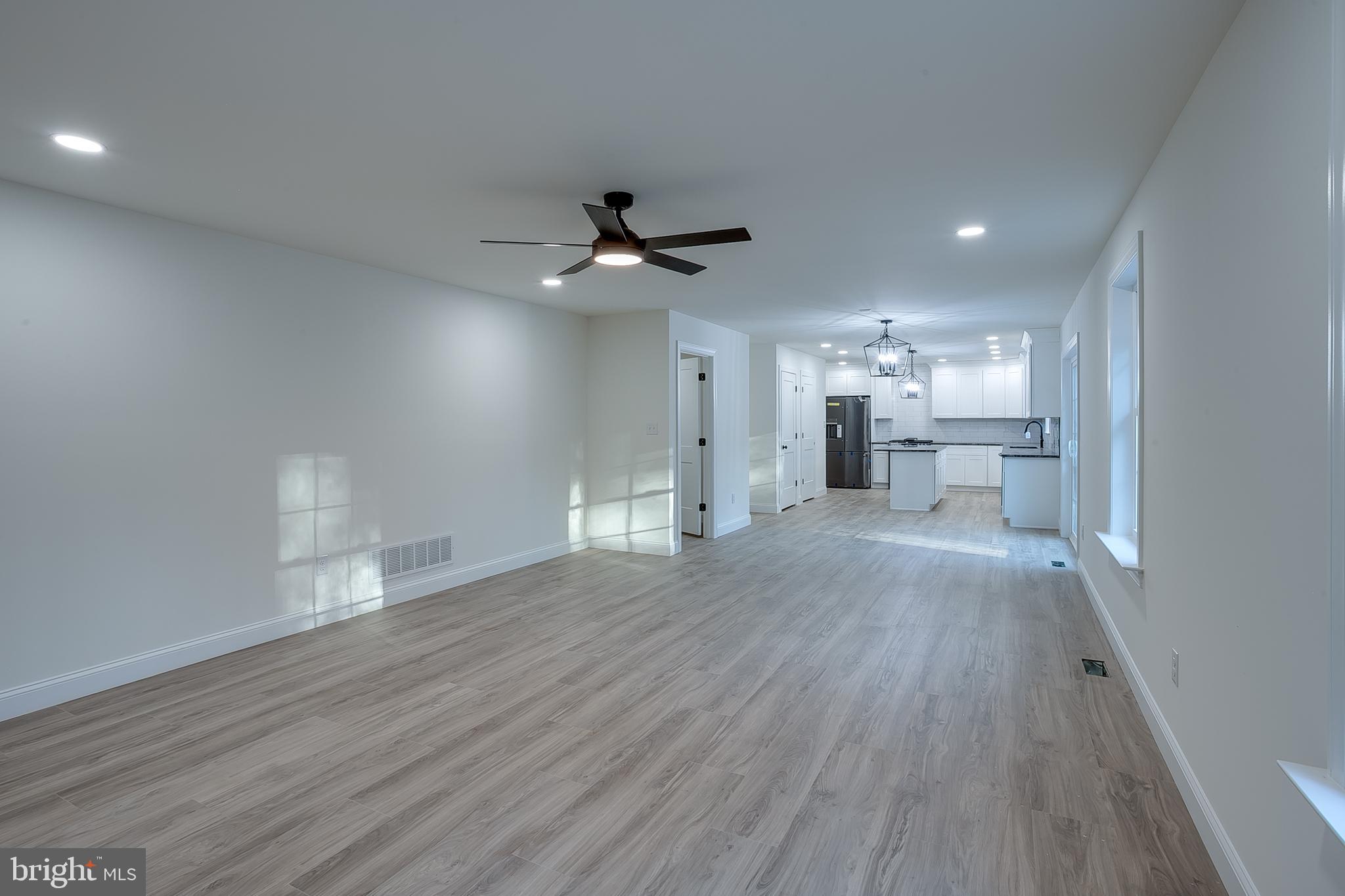 1427 Williamstown Erial Road Sicklerville, NJ 08081 - Photo 13 of 27 a view of a kitchen with a sink and a stove top oven