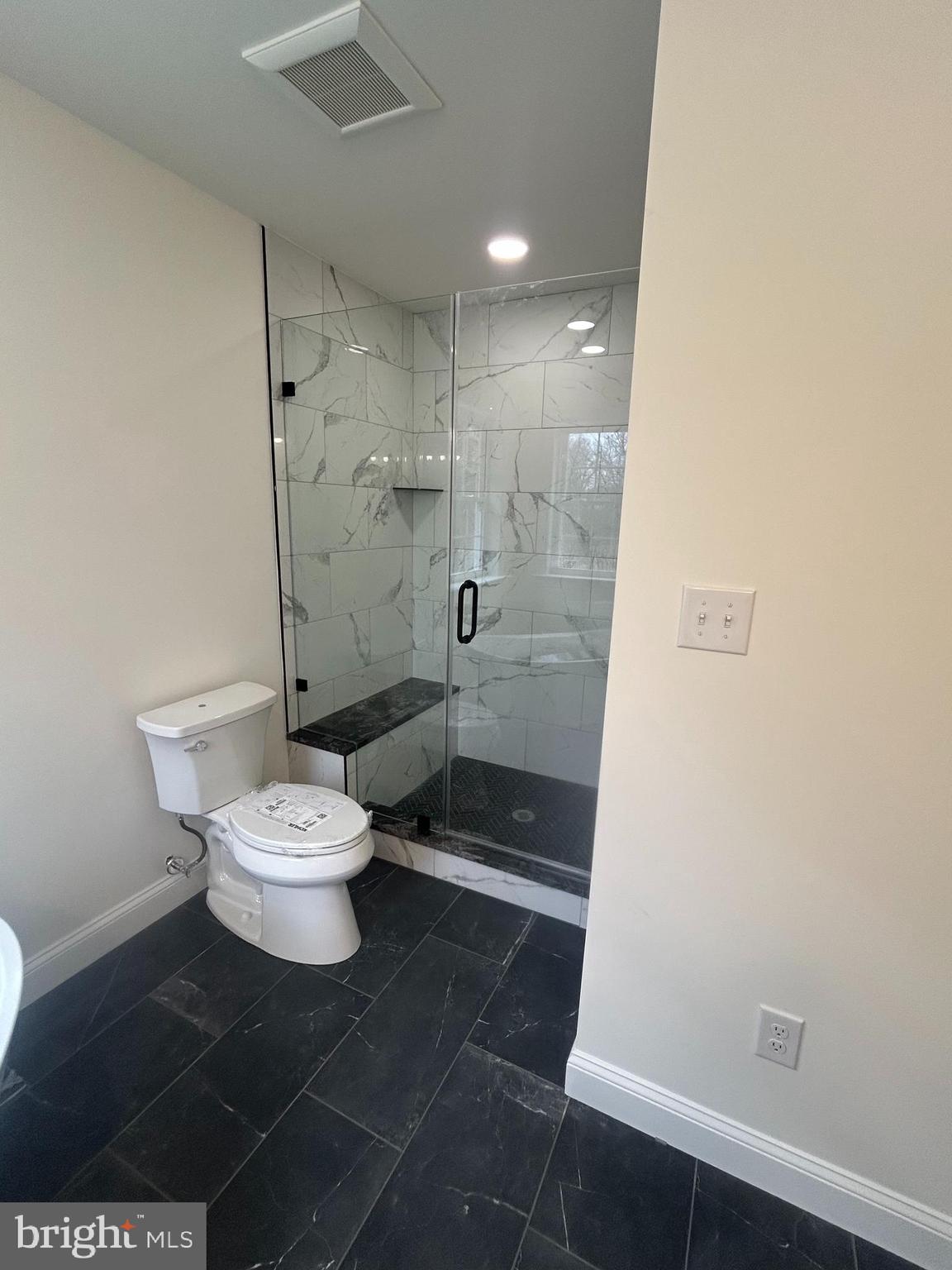 1427 Williamstown Erial Road Sicklerville, NJ 08081 - Photo 21 of 27 a bathroom with a toilet and a shower