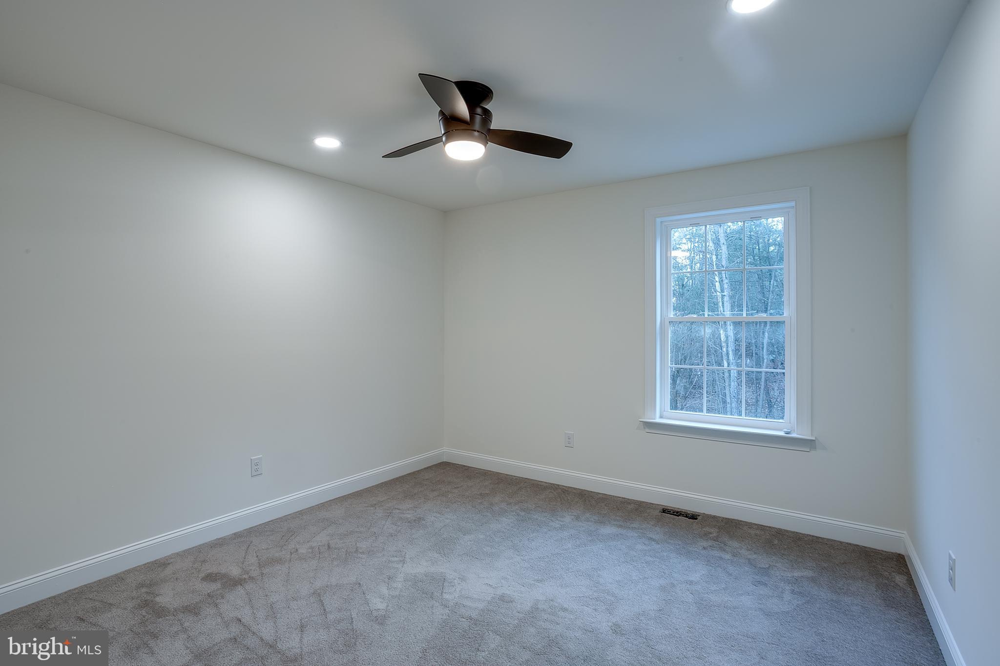 1427 Williamstown Erial Road Sicklerville, NJ 08081 - Photo 24 of 27 an empty room with a window