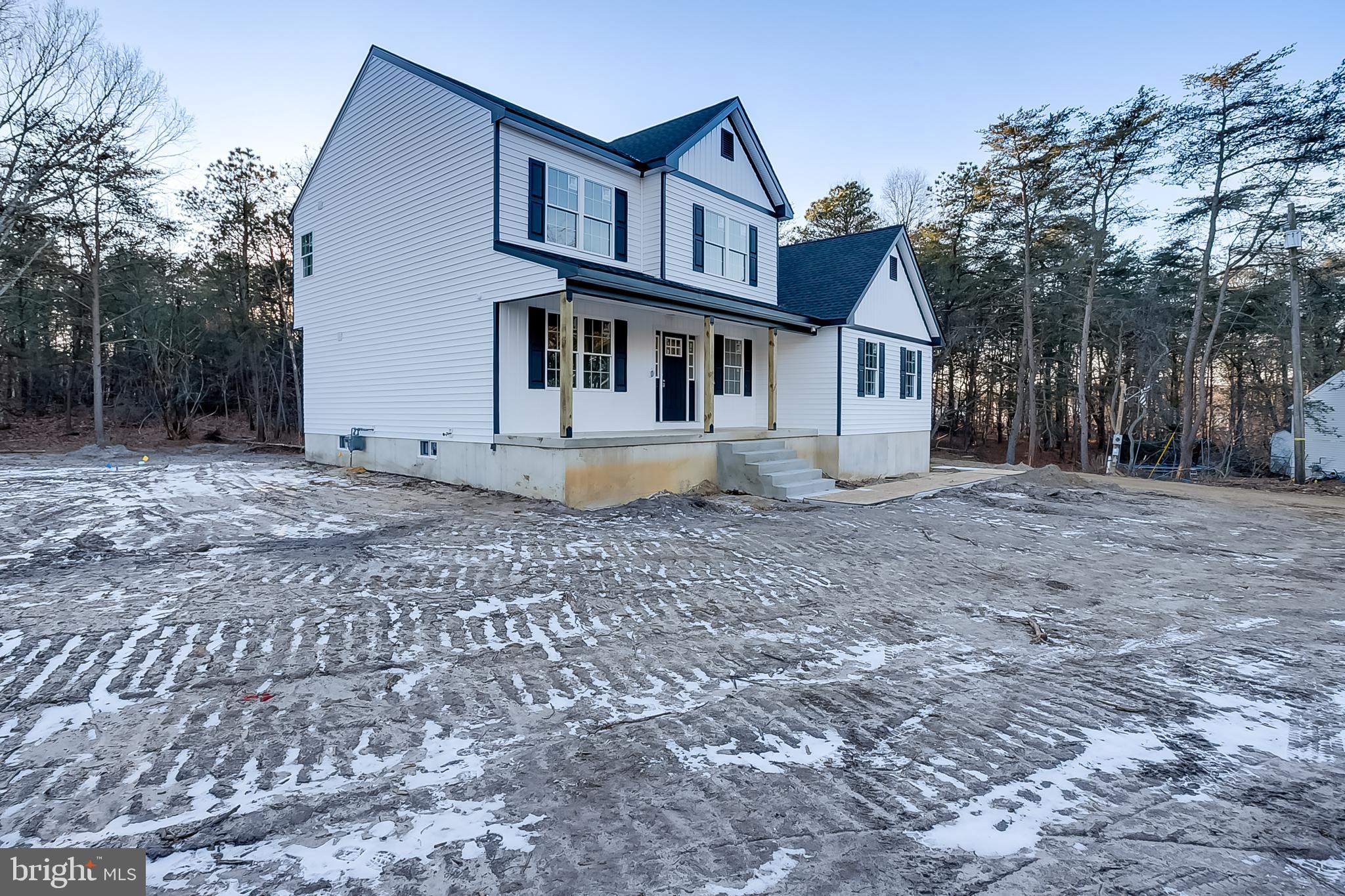 1427 Williamstown Erial Road Sicklerville, NJ 08081 - Photo 4 of 27 a front view of a house with a yard