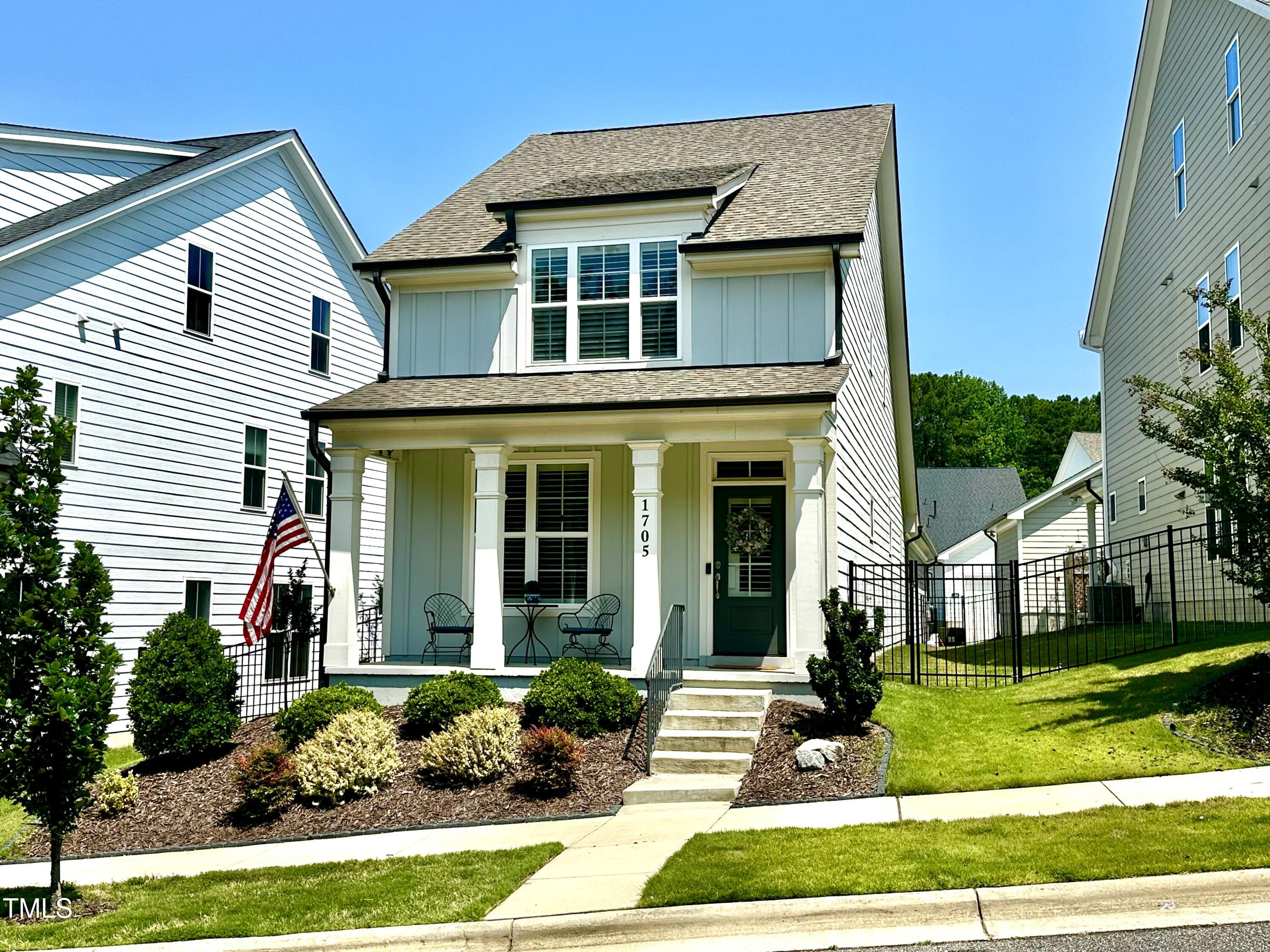 1705 Main Divide Drive Wake Forest, NC 27587 - Photo 1 of 47 front view of a house with a yard